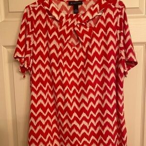 INC white/orange top